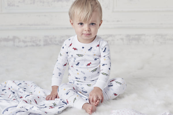 Baby boy wearing patterned onesie